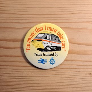 Vintage British Rail staff pin badge - yellow version
