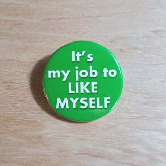 Badges and fridge magnets with the words, It's my job to like myself