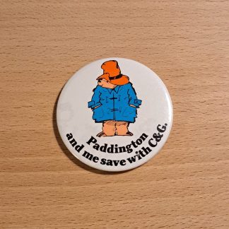 Vintage pin badge featuring the character Paddington Bear advertising the Cheltenham and Gloucester Building Society