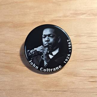 Pin badges and fridge magnets featuring John Coltrane