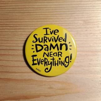 I've survived damn near everything! - Pin badge